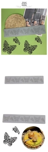Detail of grey silicone butterfly fondant mold for elegant lace cake decorating