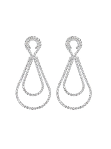 Detail of silver drop earrings with hollow teardrop design and sparkling rhinestones
