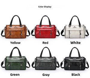 Six colors of vintage leather handbags featuring a kangaroo logo and double zipper detail