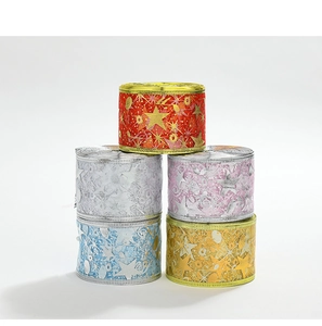 Close-up of colorful Christmas ribbons with metallic star prints in five assorted colors