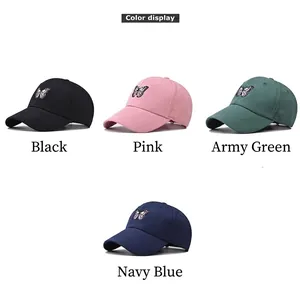Casquette en coton avec broderie papillon en noir, rose, vert armée et bleu marine