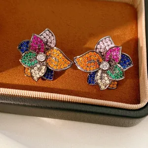 Vintage style floral stud earrings with multi-color zircon stones and silver plating