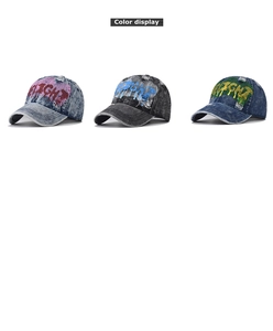 Three distressed denim baseball caps with colorful graffiti prints and frayed edges