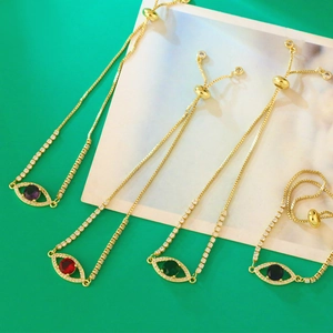 Adjustable gold evil eye bracelets set with purple, red, green and black zircon stones