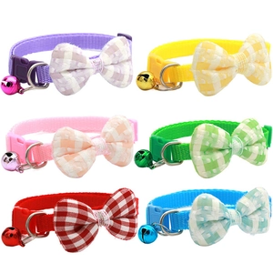 Detail view of six colorful pet collars with plaid bows and bells in 2x3 grid layout