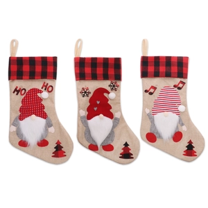 Set of 3 burlap Christmas stockings with gnome appliques and red plaid cuffs