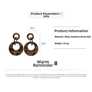 Detail view of leopard print faux fur round hoop earrings with alloy base dimensions