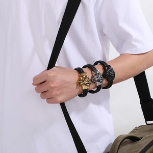 Men's woven leather bracelet with metal lion head clasp in gold, silver and black colors