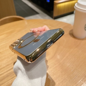 Detailed view of electroplated gold frame with precise cutouts for Samsung Galaxy S-Series
