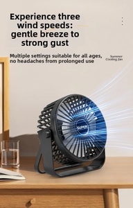 Detail view of the black USB desktop fan showing the adjustable base and airflow design