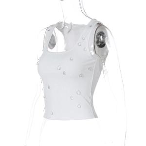 Detail view of white ribbed crop top featuring sparkling crystal water drop embellishments