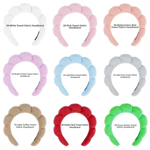 Grid view of nine colorful sponge headbands in soft terry cloth fabric for hair styling