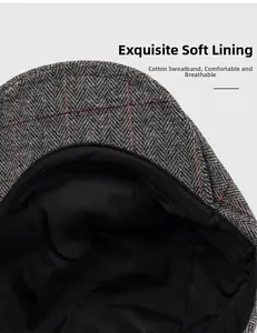 Detail of soft black lining and cotton sweatband inside the tweed newsboy cap