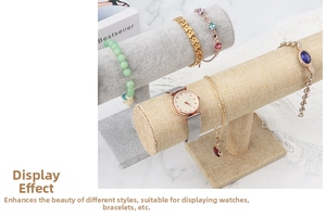 Close-up of velvet and linen T-bar display stands for bracelets and watches
