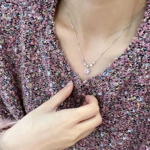 Elegant S925 sterling silver necklace with square pink zirconia and halo pendant on model