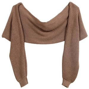 Detailed flat lay of a brown knit shrug sweater for women with ribbed cuffs on white
