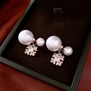Elegant white pearl flower earrings with cubic zirconia in rose gold jewelry box