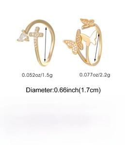 Detailed size and material specs for gold butterfly and cross copper rings with CZ