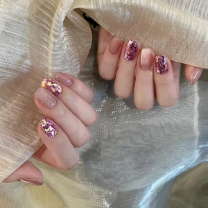 Sweet pink cat eye press-on nails with sparkling glitter sequins in short square shape