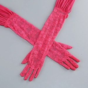Detailed view of long hot pink lace gloves with pleated cuffs on a grey background