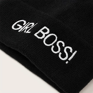 Classic black knitted beanie with white GIRL BOSS embroidery on the folded cuff