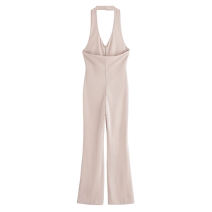 Tuta da donna con scollo all'americana e schiena scoperta in beige chiaro a zampa