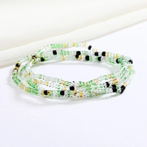 Handmade colorful glass seed bead body chain with green, gold and black elastic waist beads