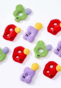 Detailed view of colorful plush squeaky dog toys with corduroy textures and cute embroidery