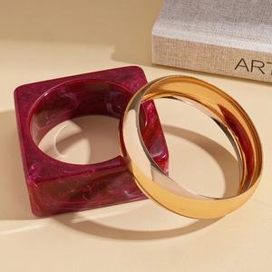 Modern acrylic marbled square bangle and polished gold round metal bracelet set