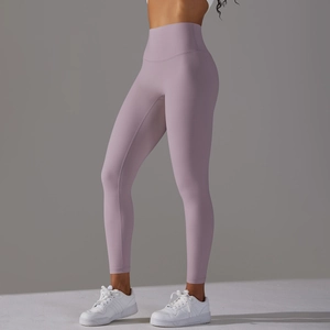 Close-up of high-waisted seamless yoga leggings in purple with lifting effect