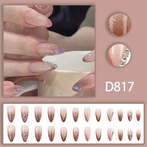 Gradient pink to brown almond press-on nails with silver glitter and rhinestone accents