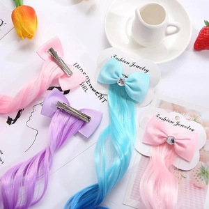 Fermagli per capelli unicorno per bambini con fiocchi e extension sintetiche ricce lunghe