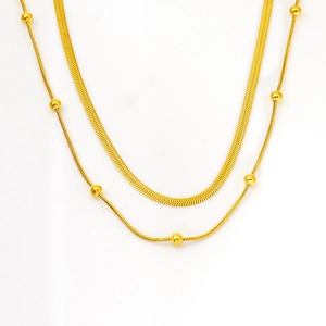 Double-layered gold snake chain necklace with beads, minimalist stainless steel jewelry