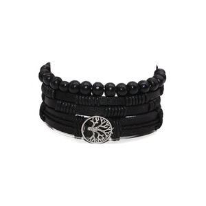 Detail of multi-layer black braided leather bracelets with silver Tree of Life charm