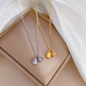 Titanium steel necklace set with lotus pod pendants in gold and silver finish