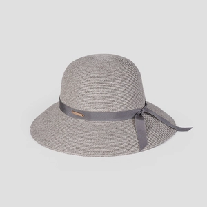 Detailed view of the woven texture and grey ribbon on this wide brim straw sun hat