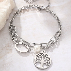 Silver tree of life double layer bracelet with white pearl on marble background