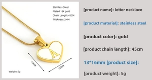 Detail view of 18K gold plated heart pendant with shell letter A and chain measurements
