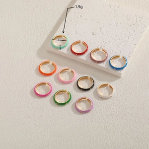 Colorful enamel zircon rings in assorted vibrant hues with gold beaded metal finish