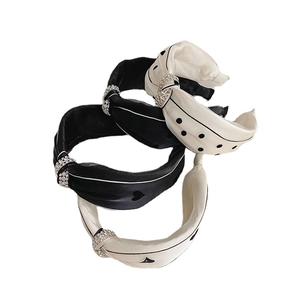 Polka dot and heart pattern knotted headbands with rhinestone accents set of four