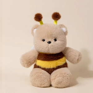 Cute teddy bear plush toy wearing a yellow bee costume with soft wings and antennas