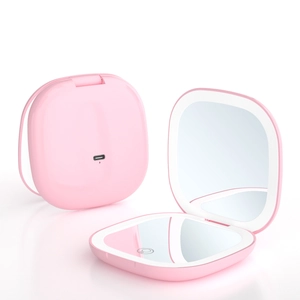 Pink portable LED makeup mirror showing Type-C charging port and open ring light detail
