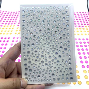 Colorful acrylic rhinestone stickers for face and nail art in assorted sizes