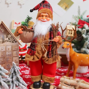 Detail view of a 12-inch standing Santa Claus doll in red plaid outfit for Christmas decor