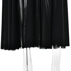 Detailed view of the sheer black mesh dress hem with elegant pleats on a studio mannequin