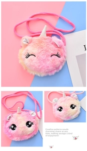 Close-up of pink unicorn plush crossbody bag showing soft texture and embroidery