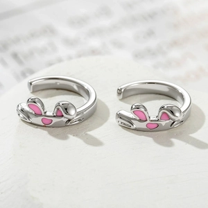 Sweet rabbit ear ear cuffs in silver finish with pink accents for non-pierced ears
