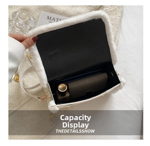 Top view of plush white shoulder bag showing interior capacity with lipstick and accessories