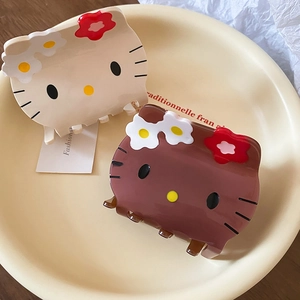 Cute acrylic cartoon cat hair claws in cream and brown with floral bow details