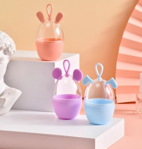 Detailed view of rabbit and mouse ear beauty sponge storage cases in various pastel colors
